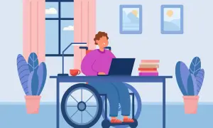 Personne en fauteuil roulant travaillant sur un ordinateur portable, cherchant des mdph aides financières pour son autonomie.
