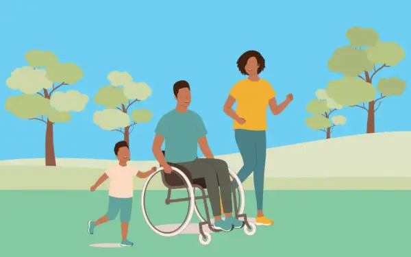 Famille heureuse au parc. Le père en fauteuil roulant, la mère et le fils profitent du soleil. Aide pour le remboursement fauteuil roulant MDPH.